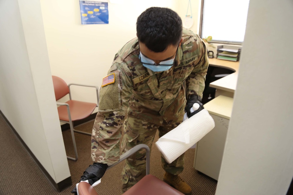 GUNG Service Members Disinfect Local Government Office