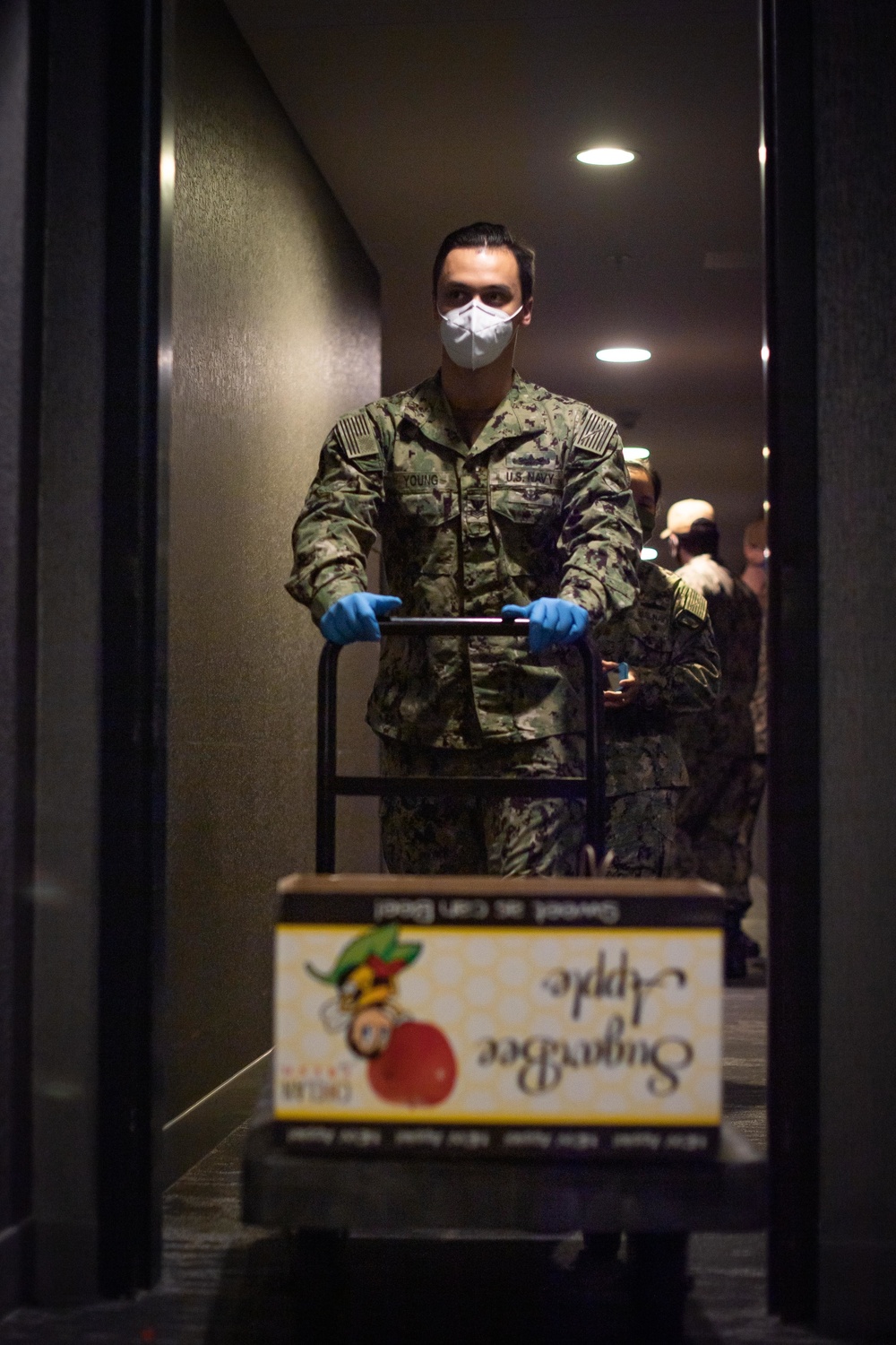Sailors take care of quarantined shipmates from USS Kidd