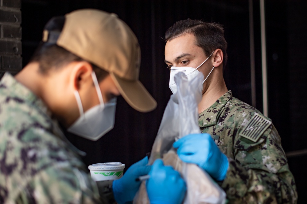 Sailors take care of quarantined shipmates from USS Kidd