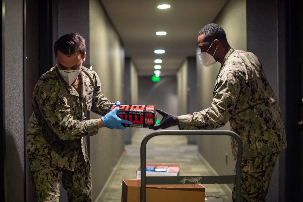 Sailors take care of quarantined shipmates from USS Kidd