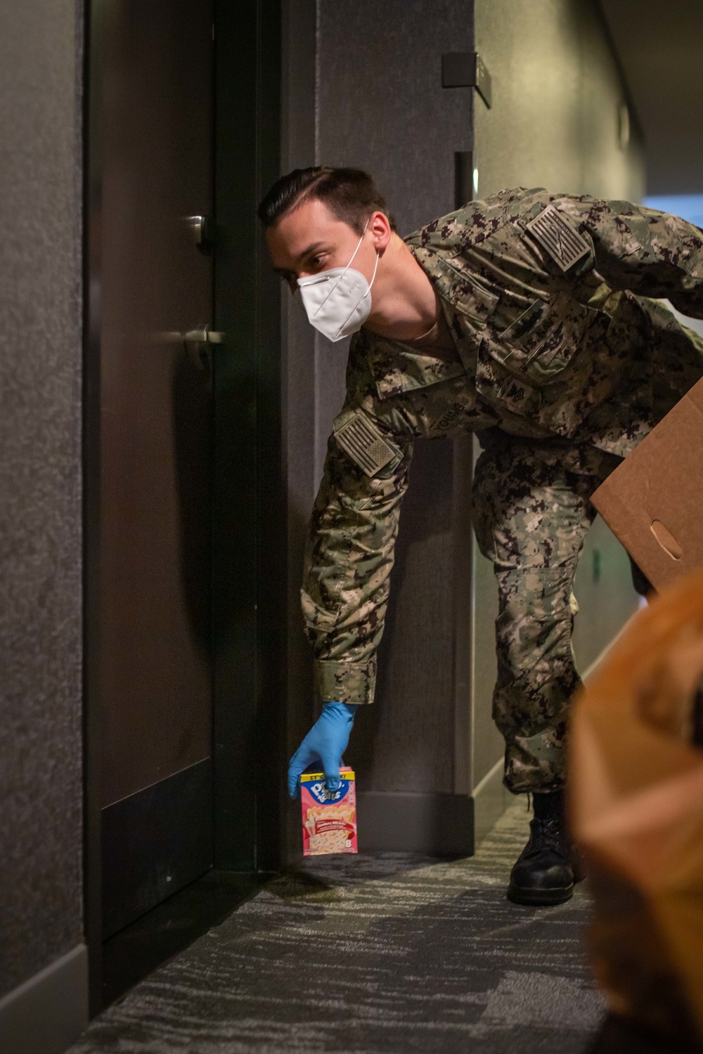 Sailors take care of quarantined shipmates from USS Kidd