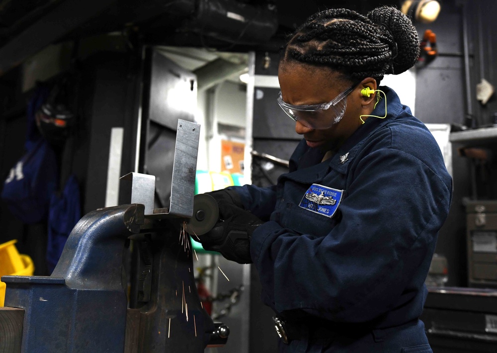 USS Blue Ridge Hull Maintenance Technician in Action