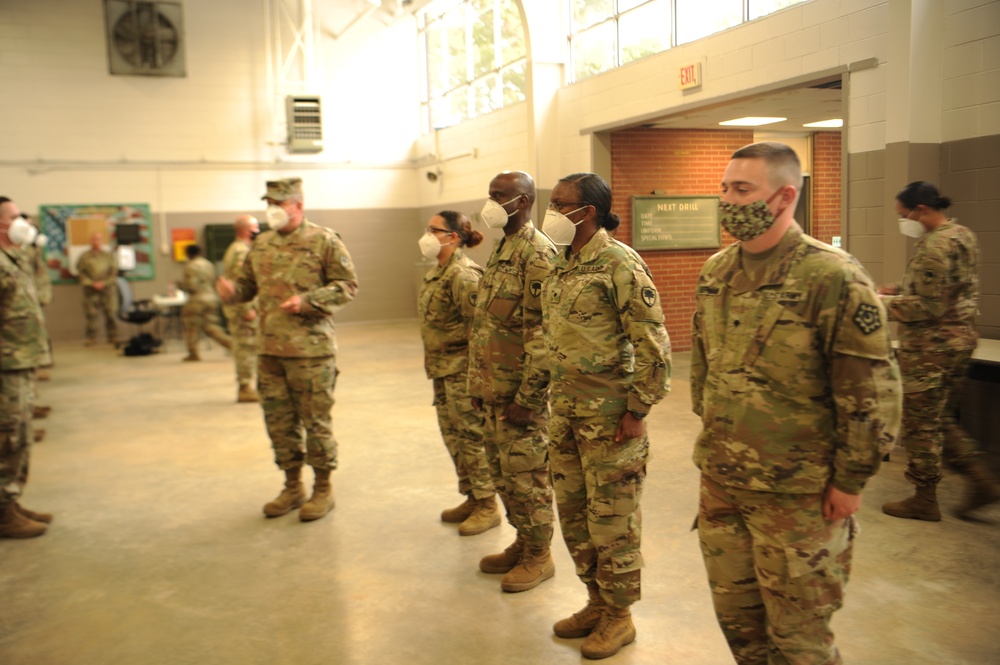 South Carolina National Guard senior leader presents coins to Soldiers activated in support of COVID-19 response efforts