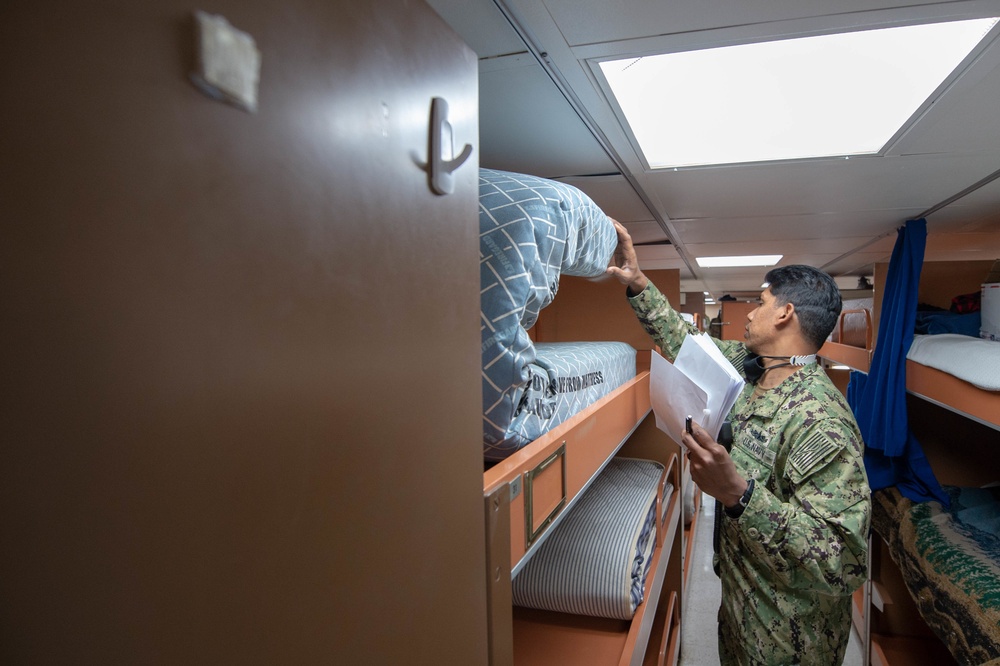 USNS Mercy Sailor Performs Berthing Inspection