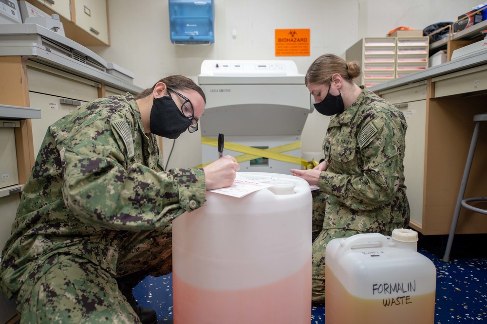 USNS Mercy Sailors Handle Hazardous Waste