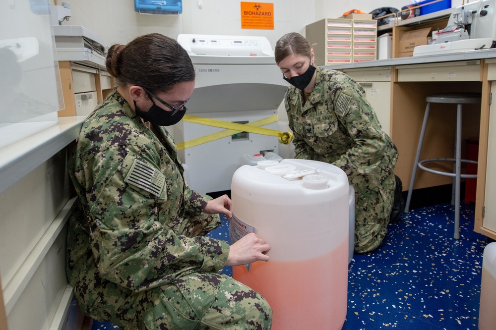 USNS Mercy Sailors Handle Hazardous Waste