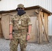 Deployed service members wear improvised face masks