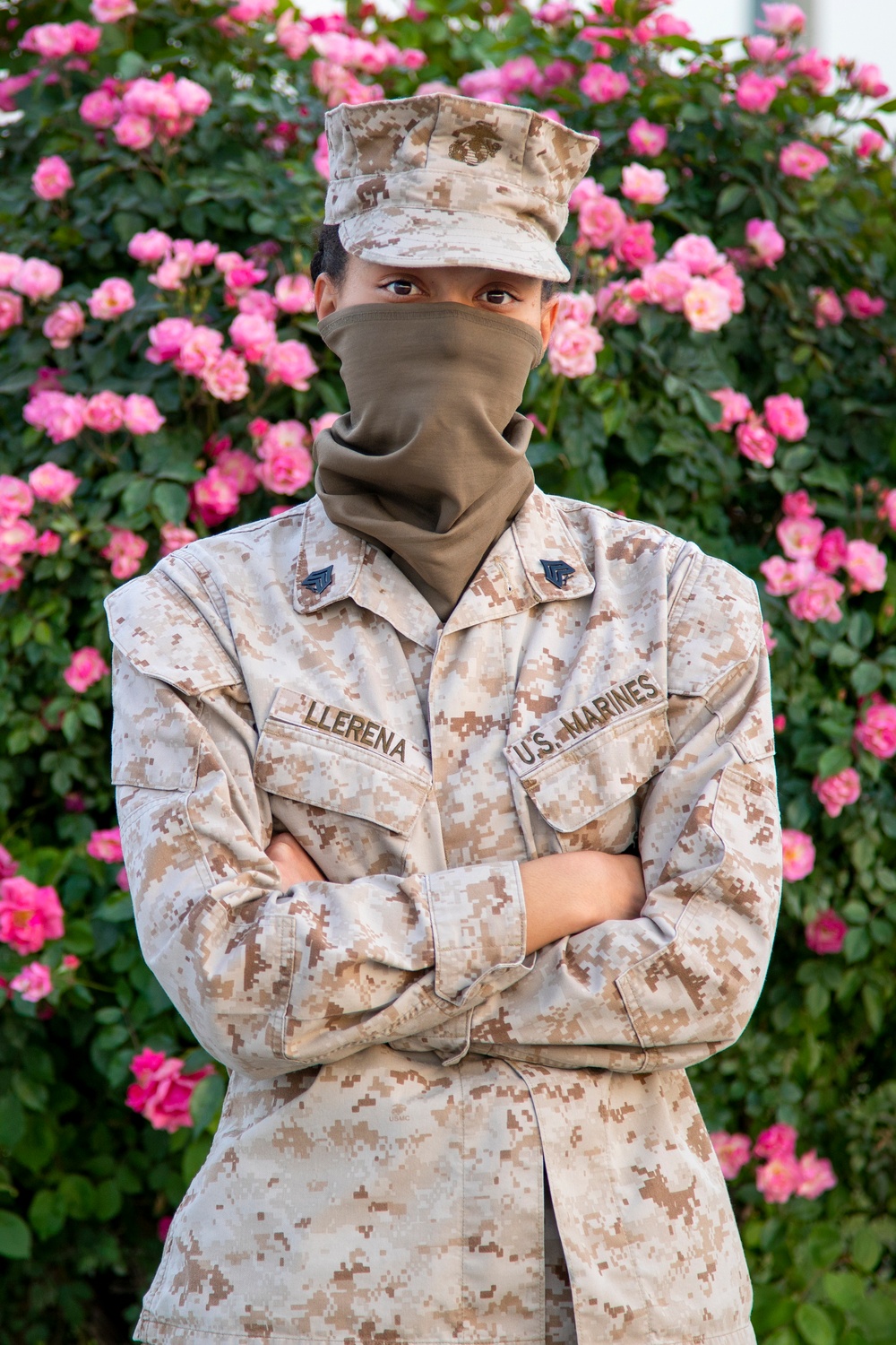 Deployed service members wear improvised face masks