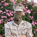 Deployed service members wear improvised face masks