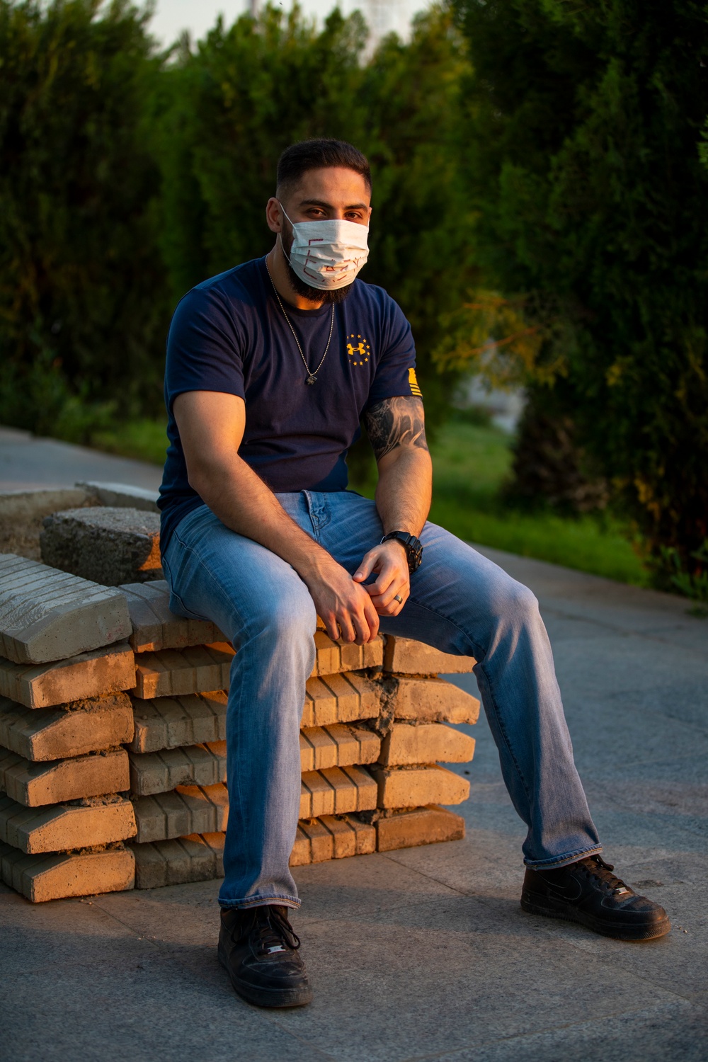 Contractor wears improvised face masks