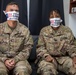 Deployed service members wear improvised face masks