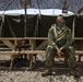 Deployed service members wear improvised face masks