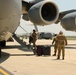 305th Aerial Port Squadron load up baggage at JBMDL