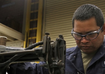 Cal Guard welder sews face masks to combat COVID-19