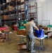 Air National Guardsmen assigned to the 149th Fighter Wing assist local food banks