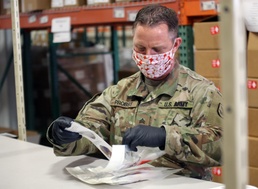 Guardsmen build COVID-19 test kits as team effort to support state