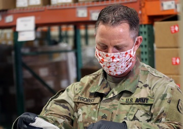 Guardsmen build COVID-19 test kits as team effort to support state