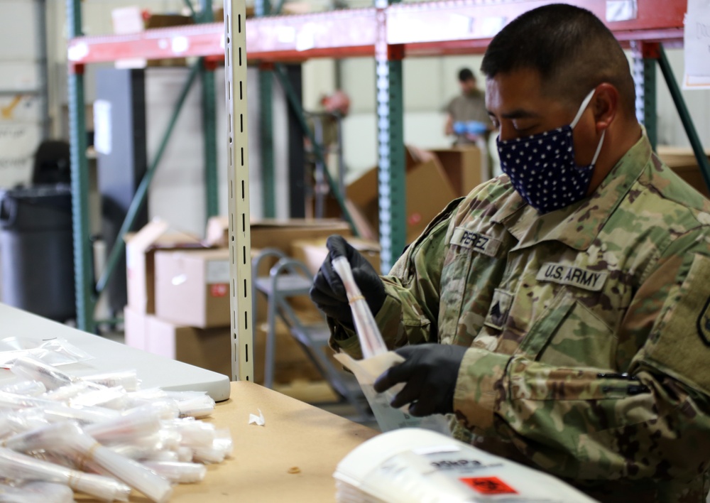 Guardsmen build COVID-19 test kits as team effort to support state