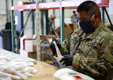Guardsmen build COVID-19 test kits as team effort to support state