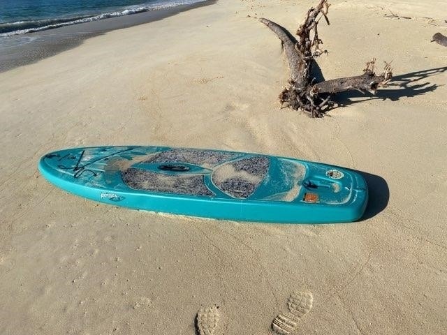 Imagery Available: Coast Guard seeks help to identify owner of paddle board on Bellows Beach