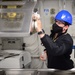 GHWB Sailor Sanitizes Metal