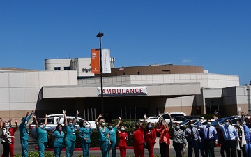146th Airlift Wing salutes health care workers with flyover