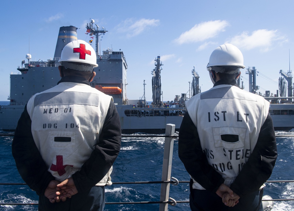 Sterett and Henry J. Kaiser participate in a replenishment-at-sea