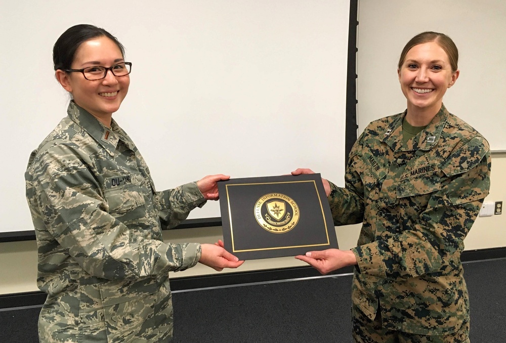 DC Air National Guard 2nd Lt Deborah Ou-Yang and her instructor, Marine Capt Skye Martin, at PAQC graduation