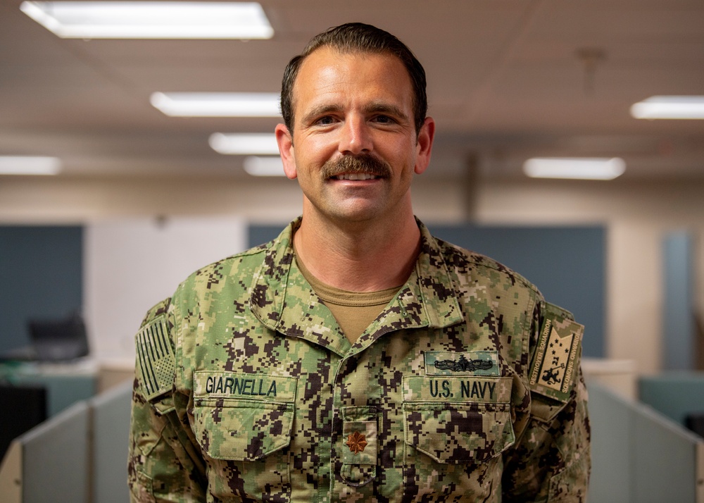 USNS Mercy Sailor Poses for Photo