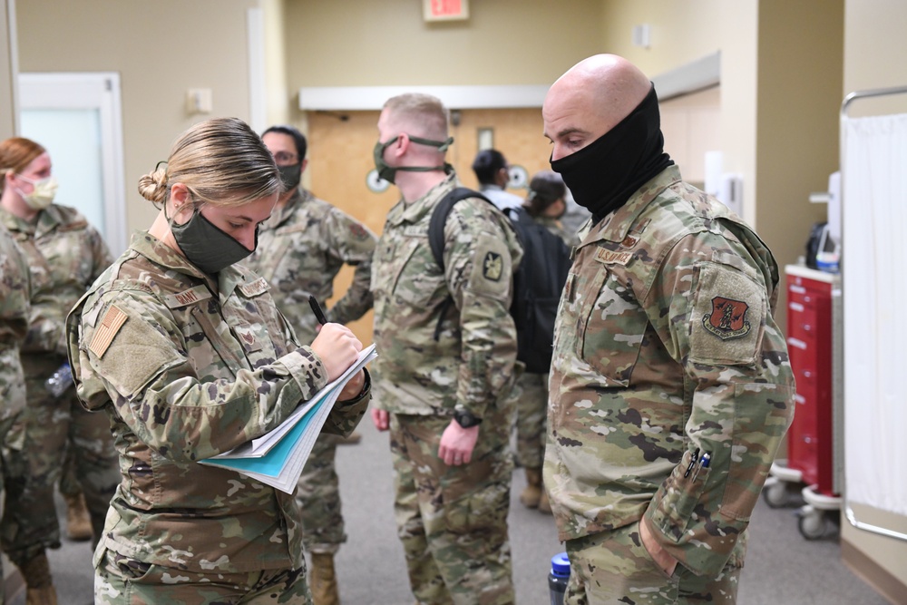 North Carolina Army and Air National Guard Medical Technicians Set Up COVID-19 Medical Support Shelter