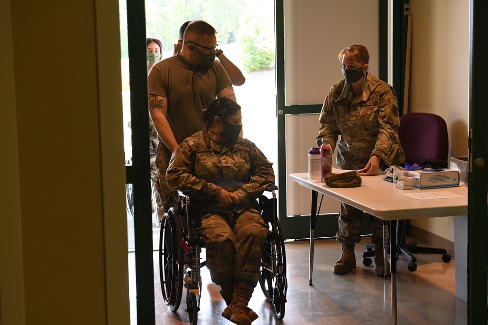 North Carolina Army and Air National Guard Medical Technicians Set Up COVID-19 Medical Support Shelter