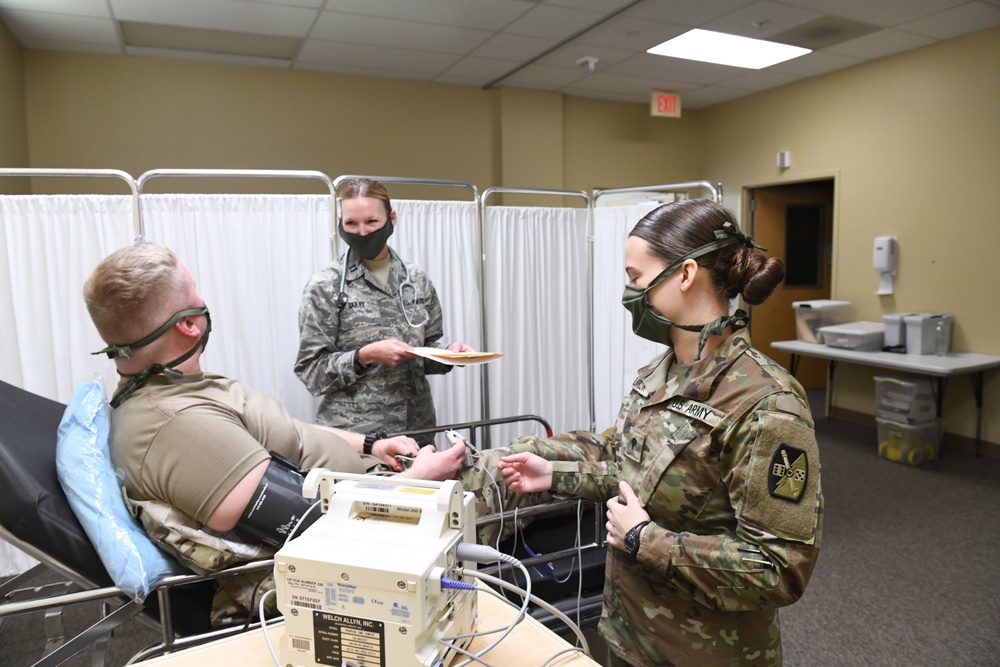 North Carolina Army and Air National Guard Medical Technicians Set Up COVID-19 Medical Support Shelter