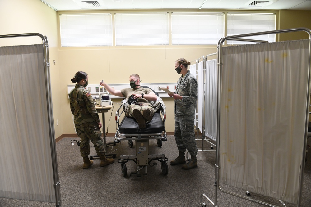 North Carolina Army and Air National Guard Medical Technicians Set Up COVID-19 Medical Support Shelter