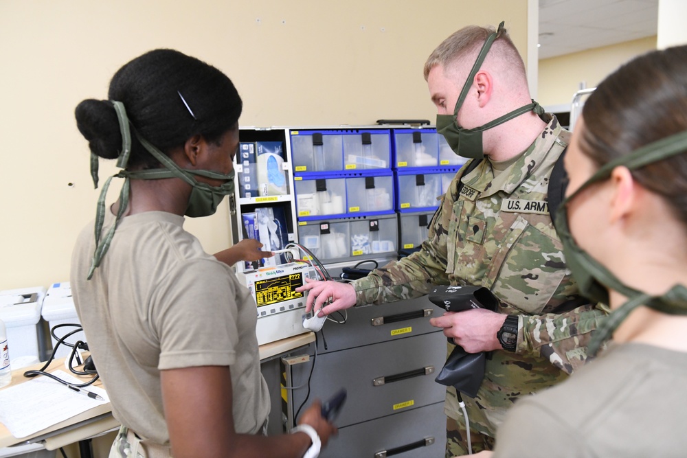 North Carolina Army and Air National Guard Medical Technicians Set Up COVID-19 Medical Support Shelter