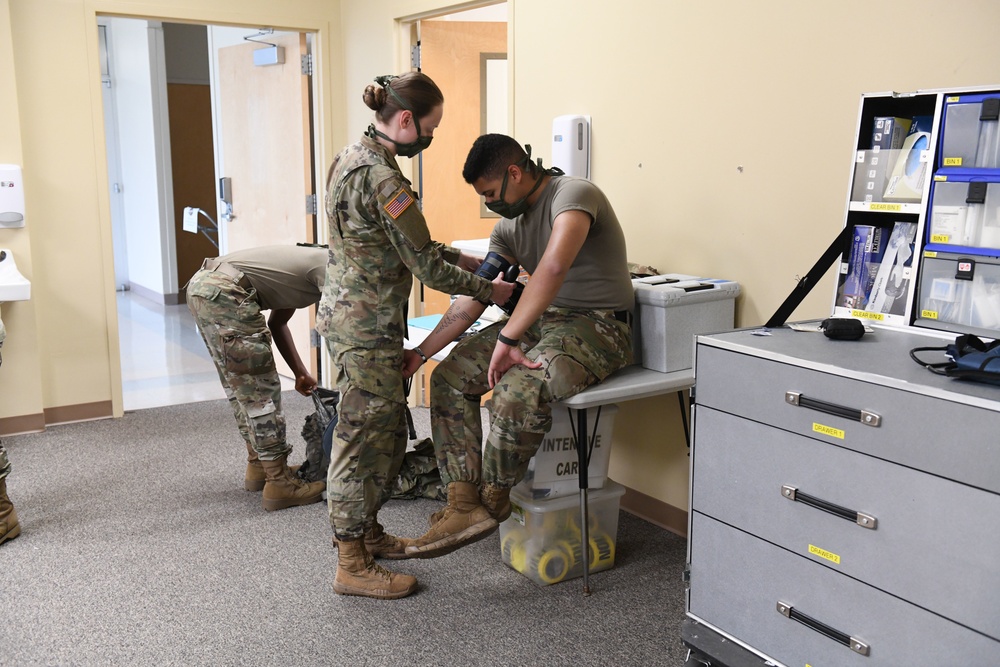 North Carolina Army and Air National Guard Medical Technicians Set Up COVID-19 Medical Support Shelter