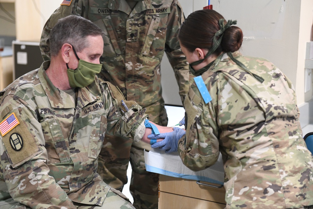 North Carolina Army and Air National Guard Medical Technicians Set Up COVID-19 Medical Support Shelter