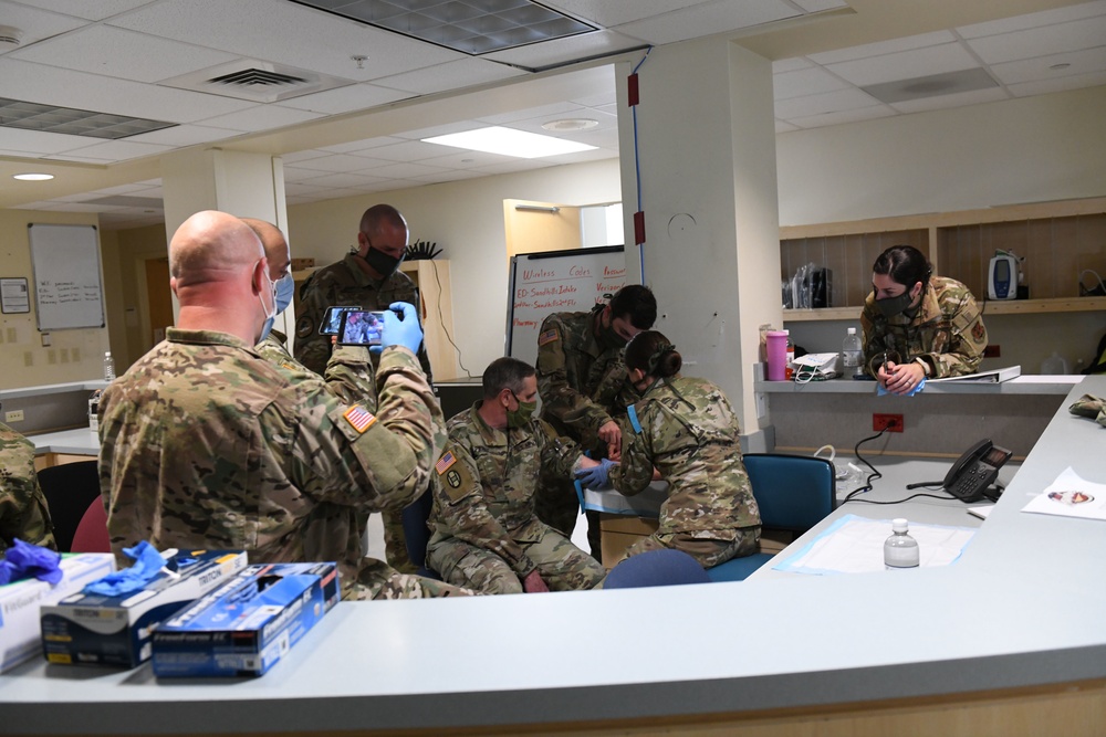 North Carolina Army and Air National Guard Medical Technicians Set Up COVID-19 Medical Support Shelter