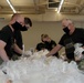 Soldiers help serve school lunches