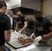 Soldiers help serve school lunches