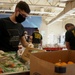 Soldiers help serve school lunches