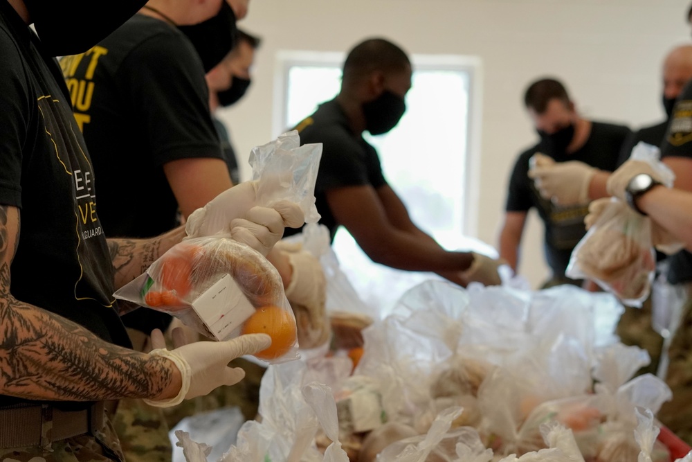 Soldiers help serve school lunches