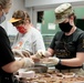 Soldiers help serve school lunches