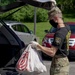 Soldiers help serve school lunches