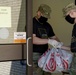 Soldiers help serve school lunches