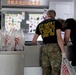 Soldiers help serve school lunches