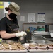Soldiers help serve school lunches