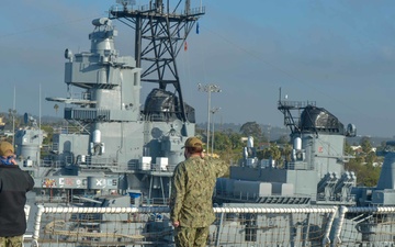 USNS Mercy Sailors Render Salute