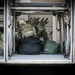 Urban Augmented Medical Task Force 452-1 loads bags to travel home