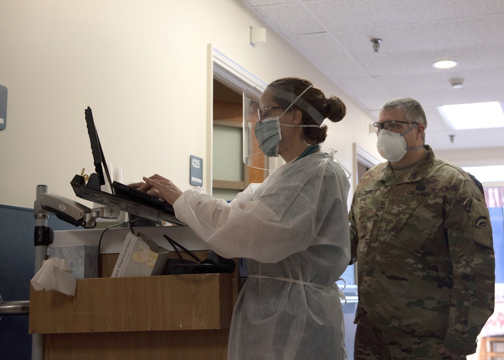 Mass. Guard members utilize civilian medical training in the COVID-19 fight