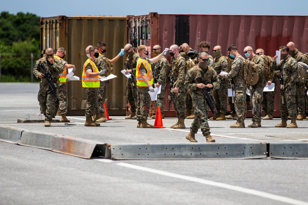 Marines in route to Darwin arrive in Okinawa for first of two 14-day quarantine periods